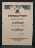 powiększ